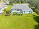 Single-story home with large backyard, and a pool at 1355 Hempstead Ave, North Port, FL 34286