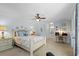 Bright bedroom with a king-size bed and an ensuite bathroom at 1355 Hempstead Ave, North Port, FL 34286