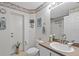 Clean bathroom with single vanity and shower/tub combo at 1355 Hempstead Ave, North Port, FL 34286