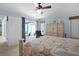 Primary bedroom with sliding glass doors leading to the patio at 1355 Hempstead Ave, North Port, FL 34286