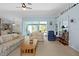 Living room with view of pool and lanai at 1355 Hempstead Ave, North Port, FL 34286