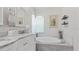 Relaxing bathroom with soaking tub and double vanity at 2556 Saturday St, North Port, FL 34288