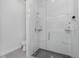 Spa-like bathroom with a glass shower and marble walls at 2743 Hopwood Rd, North Port, FL 34287