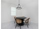 Bright dining area with a round table and four chairs at 2743 Hopwood Rd, North Port, FL 34287