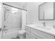 Clean bathroom with a tub, shower, and white vanity at 2743 Hopwood Rd, North Port, FL 34287