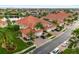 Aerial view showcasing a home's exterior and landscaping at 2630 Tarpon Cove Dr # 212, Punta Gorda, FL 33950