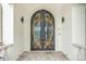 Grand entryway with ornate double doors at 5000 Palermo Dr, Punta Gorda, FL 33950
