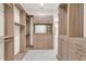 Large walk-in closet with ample shelving and drawers at 5000 Palermo Dr, Punta Gorda, FL 33950
