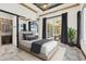 Bright bedroom with access to a walk-in closet at 5000 Palermo Dr, Punta Gorda, FL 33950