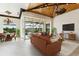 Open concept living room with view of pool and access to outdoor space at 5000 Palermo Dr, Punta Gorda, FL 33950