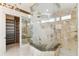 Large walk-in shower with unique glass etching at 5000 Palermo Dr, Punta Gorda, FL 33950