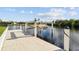 Private dock with a boat lift for convenient water access at 5000 Palermo Dr, Punta Gorda, FL 33950
