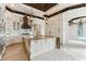 Spacious kitchen with large island, custom cabinetry, and high-end appliances at 5000 Palermo Dr, Punta Gorda, FL 33950