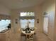 Bright kitchen nook with white table and chairs, perfect for casual dining at 24059 Buckingham Way, Punta Gorda, FL 33980