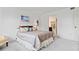 Spacious bedroom with a king-size bed and neutral color palette at 175 Kings Hwy # 437-Bldg 4, Punta Gorda, FL 33983