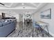 Spacious living area showcasing modern decor, marble floors, and an open floor plan at 1425 Park Beach Cir # 127, Punta Gorda, FL 33950