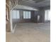 Well-lit parking garage with designated parking spaces and visible signage at 1425 Park Beach Cir # 127, Punta Gorda, FL 33950