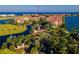 Aerial view of upscale condo community with water access and lush landscaping at 95 Vivante Blvd # 9542, Punta Gorda, FL 33950