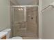 Bathroom with shower stall and tiled walls at 95 Vivante Blvd # 9542, Punta Gorda, FL 33950