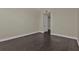 Bedroom with hardwood floors, neutral walls, and access to balcony at 95 Vivante Blvd # 9542, Punta Gorda, FL 33950