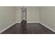 Spacious bedroom with hardwood floors and access to hallway at 95 Vivante Blvd # 9542, Punta Gorda, FL 33950