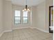 Bright dining area with tile floors and large windows at 95 Vivante Blvd # 9542, Punta Gorda, FL 33950