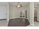 Condo entryway with tiled floors, neutral walls and arched mirrors at 95 Vivante Blvd # 9542, Punta Gorda, FL 33950