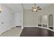 Condo entryway with tiled floors, neutral walls and arched mirrors at 95 Vivante Blvd # 9542, Punta Gorda, FL 33950