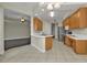 Open concept kitchen with stainless steel appliances and an island at 95 Vivante Blvd # 9542, Punta Gorda, FL 33950