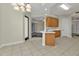 Eat-in kitchen with light wood cabinets and stainless steel appliances at 95 Vivante Blvd # 9542, Punta Gorda, FL 33950