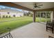 Screened porch overlooks the grassy backyard at 4323 Michaler St, North Port, FL 34286