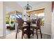 Casual breakfast nook with wicker chairs and view of the pool at 431 Via Esplanade, Punta Gorda, FL 33950