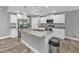 Open kitchen with a large island and granite countertops at 14516 San Domingo Blvd, Port Charlotte, FL 33981