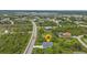 Property location shown from above at 14516 San Domingo Blvd, Port Charlotte, FL 33981