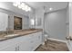 Double vanity bathroom with granite countertops and a walk-in shower at 14516 San Domingo Blvd, Port Charlotte, FL 33981