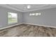 Bright bedroom with tile floors and multiple windows at 14516 San Domingo Blvd, Port Charlotte, FL 33981
