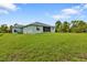 House with a large backyard at 14516 San Domingo Blvd, Port Charlotte, FL 33981