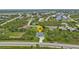 Property location shown from above at 14516 San Domingo Blvd, Port Charlotte, FL 33981