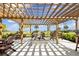 Relaxing pergola with fire pit and seating area at 1425 Park Beach Cir # 127, Punta Gorda, FL 33950