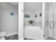 Soaking tub and walk-in shower with marble tile at 1425 Park Beach Cir # 127, Punta Gorda, FL 33950