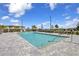Inviting community pool with lounge chairs at 1425 Park Beach Cir # 127, Punta Gorda, FL 33950