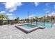 Community pool and spa with ample deck space at 1425 Park Beach Cir # 127, Punta Gorda, FL 33950