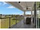 Spacious balcony with outdoor seating and water views at 1425 Park Beach Cir # 127, Punta Gorda, FL 33950