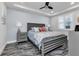 Main bedroom with king bed, nightstands and coastal decor at 1425 Park Beach Cir # 127, Punta Gorda, FL 33950