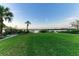 Spacious waterfront backyard perfect for relaxation at 6100 Riverside Dr, Punta Gorda, FL 33982