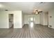 Spacious living room with hardwood floors and ceiling fan at 1638 Harmony Dr, Port Charlotte, FL 33952