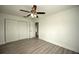Bright bedroom with double door closet and laminate flooring at 1638 Harmony Dr, Port Charlotte, FL 33952