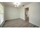 Dining room featuring hardwood floors and kitchen access at 1638 Harmony Dr, Port Charlotte, FL 33952
