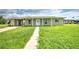 Front view of a renovated single story home at 1638 Harmony Dr, Port Charlotte, FL 33952