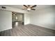 Open living area with hardwood floors and view to entry at 1638 Harmony Dr, Port Charlotte, FL 33952